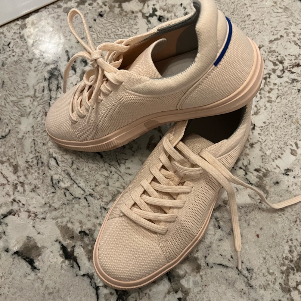 Rothy’s blush pink size 8.5 lace up tennis shoes. Super cute and stretchy!